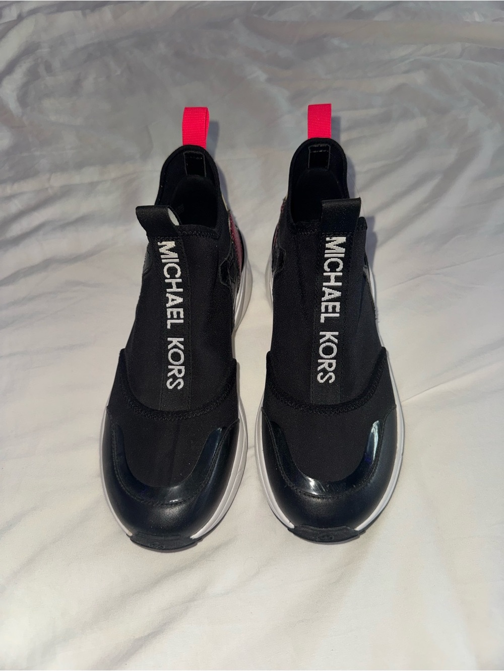 Michael Kors Kids Black Slip-On Sneakers with Hot Pink Heel Tab